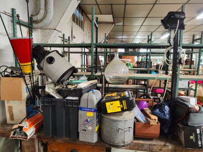 a room filled with lots of clutter and tools