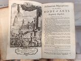 an open book with a picture of people on it