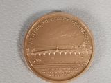 an image of a coin with a picture of a bridge on it