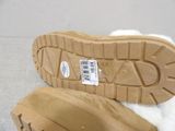 a close up of a pair of shoes that are on the ground