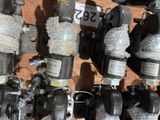 many different types of valves on display in a store
