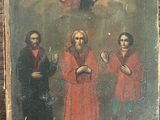an old painting of three men in red robes standing next to each other