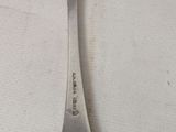 a spoon that has a spoon on it on a table