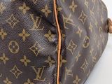 an image of a louis vuitton bag on a white surface