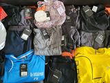 a lot of clothes that are in a box together
