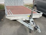 a trailer that is parked in the parking lot
