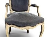 an image of a chair with a blue upholstered seat