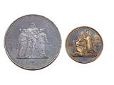 une image représentant une pièce de monnaie sur laquelle figurent un homme et une femme