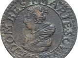 a close up of a coin with an image of a man on it