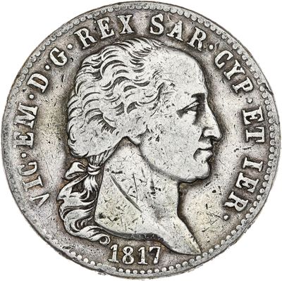 une pièce d'argent portant une tête de femme