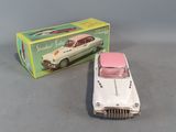 a toy car and a box on a table
