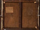 an old picture of a wooden frame with a piece of paper on it
