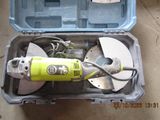 a tool in a case that is sitting on the floor