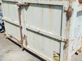 a dumpster that is sitting in the parking lot