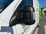 a van that has a side view mirror on the side of it