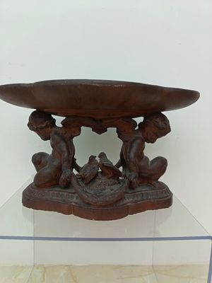 a glass table with a bowl on top of it