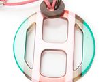 pink, green, and white necklace with a letter h on a pink cord