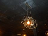 a light that is hanging from the ceiling in the room