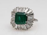 an emerald and diamond ring
