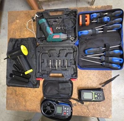 a lot of tools that are sitting on a table