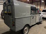 an image of a small truck parked in a garage