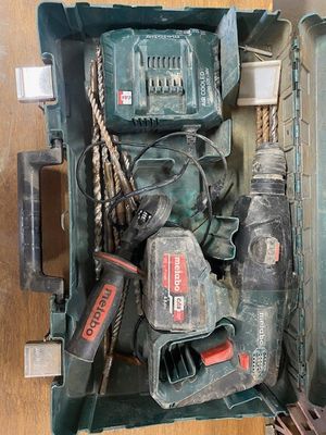 a box with tools in it sitting on a table