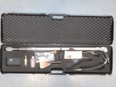a black case with tools inside of it on a table