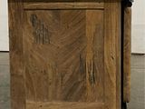 a small wooden table with a drawer on it