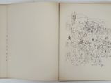 an open book with a drawing of a landscape in it