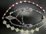 a close up of a bunch of beads on a table