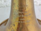 a close up of a brass bell on a table