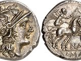 a silver coin with an image of a man on a horse