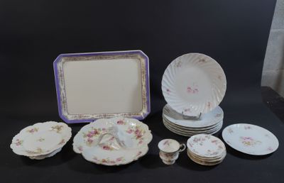 a lot of plates and bowls on the table