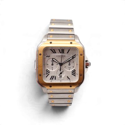 une image représentant une montre-bracelet en argent et en or, avec des chiffres romains