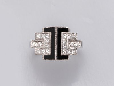 an art deco diamond and onyxine ring