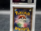 a close up of a pokemon trading card in a plastic holder