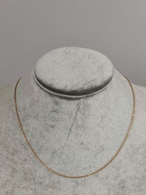 a close up of a necklace on a mannequin mannequin