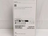the back of a white box with a green label on it