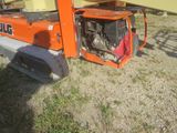 a small machine that is sitting in the grass