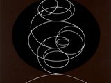 a black and white drawing of circles on a black background