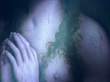 a painting of a woman holding her hands in front of a purple light