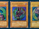 three cards with different designs on them on a blue background