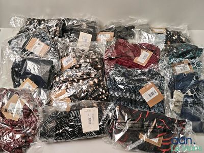 many different types of ties in bags on the table