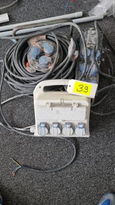 a lot of wires and electrical equipment on the floor