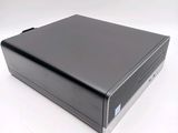 an image of a black computer case sitting on top of a white surface