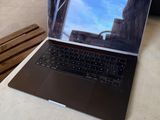 a laptop that is sitting on a table in a room