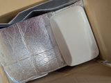 a box that has a phone inside of it