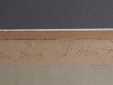 a close up of a piece of cardboard with writing on it