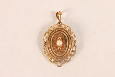 Broche pendentif en or jaune 750 ‰ de forme ovale sertie d'u… - Photo 1
