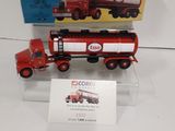 a red truck and a red truck with a box on the back